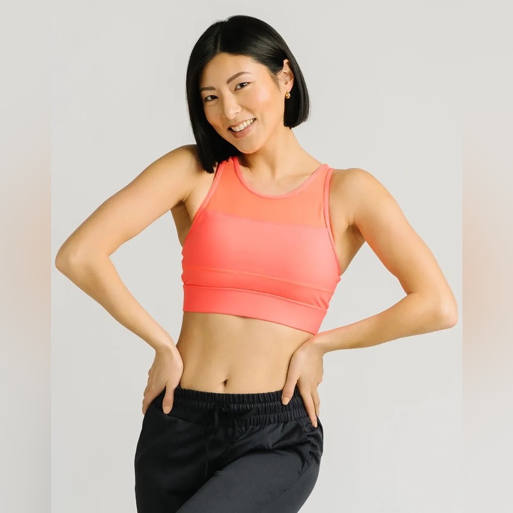 Like new Zyia All Star sports bra in beautiful coral color, size large.